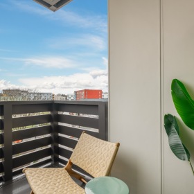 Private patios with views outdoor patio with chair and plant
