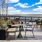 outdoor patio with seating and a view of the sky