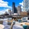outdoor patio with a view of a city in the background