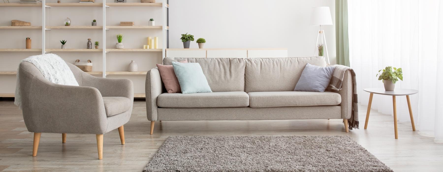 a living room with a couch and a table