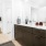bathroom with a large sink and mirror