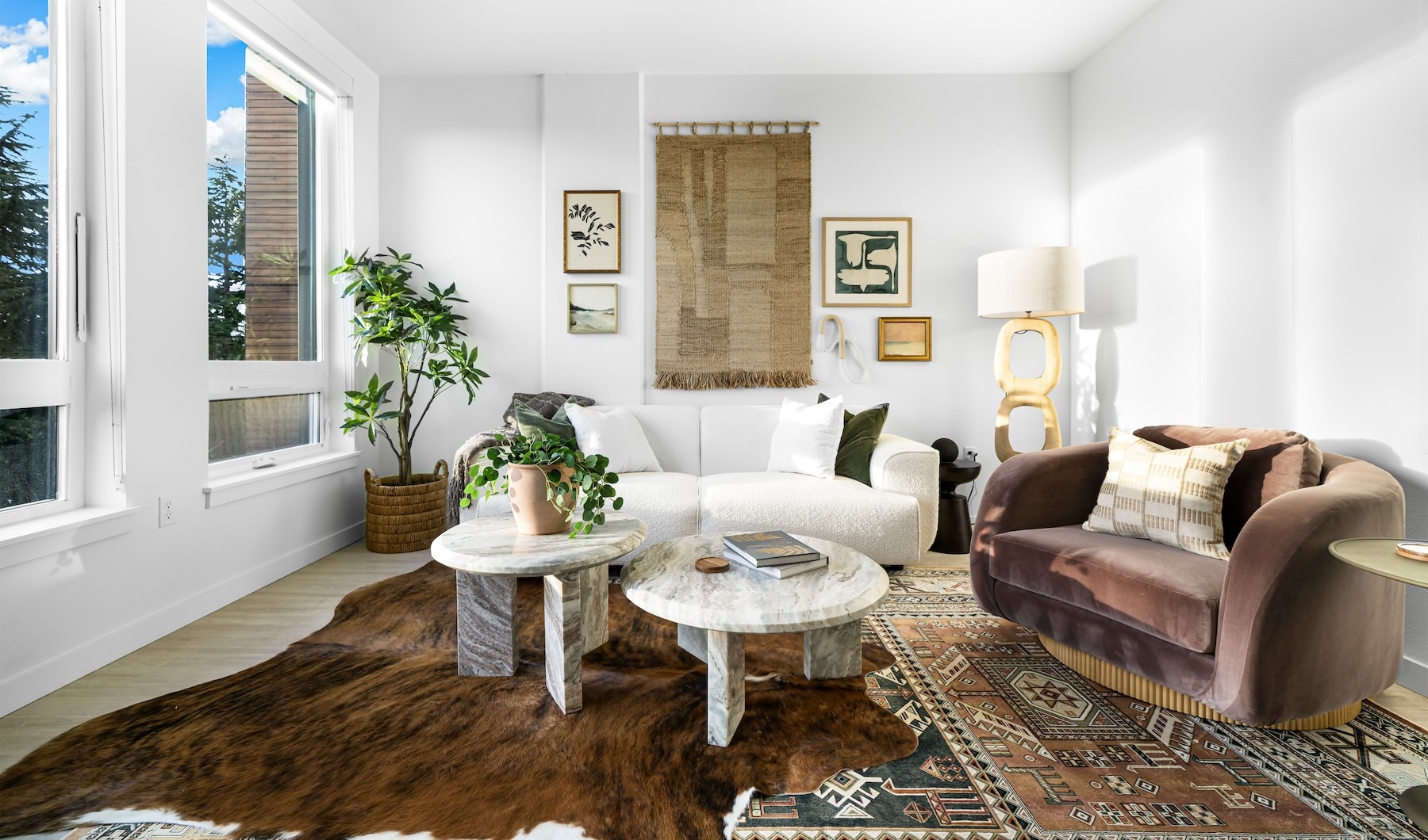 Generous living spaces to relax and unwind living room with a large couch and chair