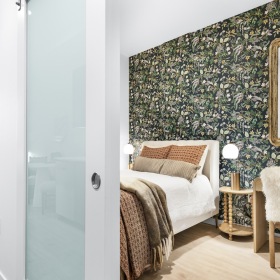 Sleep in style bedroom with a desk, chair, and bed