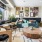 cafe area with seating and large windows